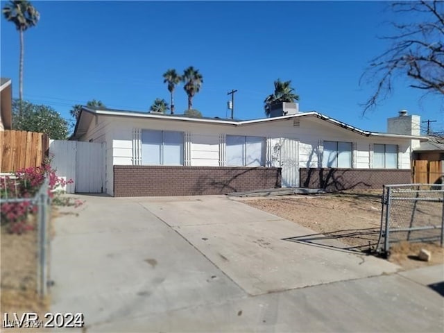 ranch-style house featuring a patio