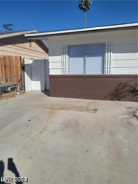 view of home's exterior with a patio area