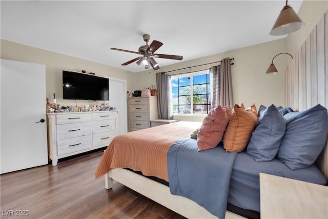 bedroom featuring hardwood / wood-style floors and ceiling fan