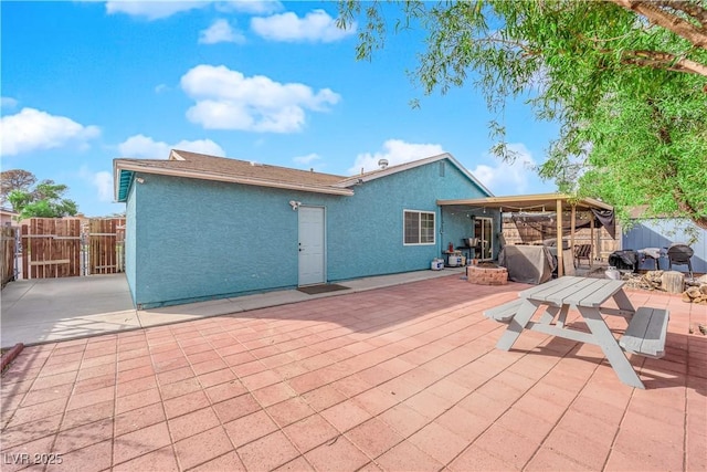 rear view of house featuring a patio area