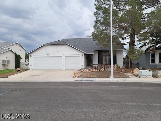 view of front of property with a garage