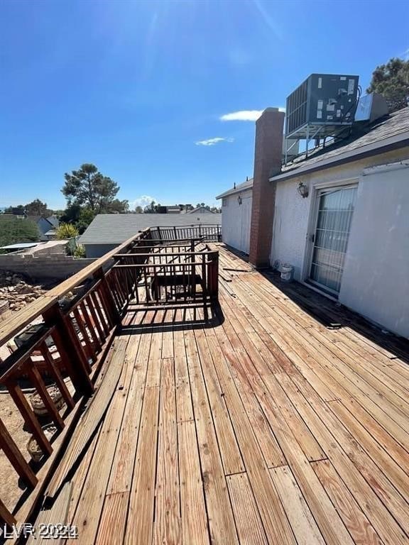 wooden terrace featuring central AC