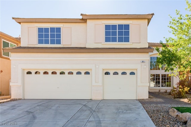 view of front of property with a garage