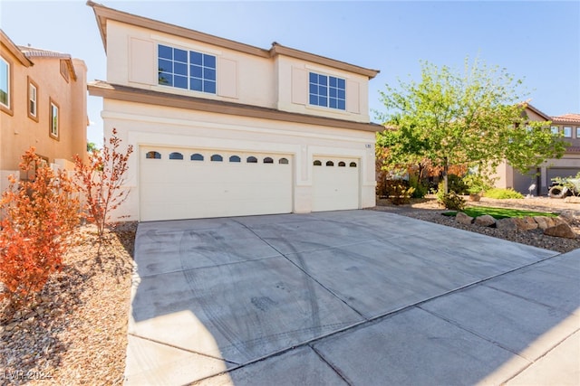 front facade with a garage