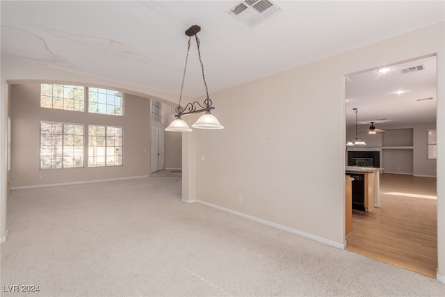 interior space featuring light hardwood / wood-style flooring and ceiling fan