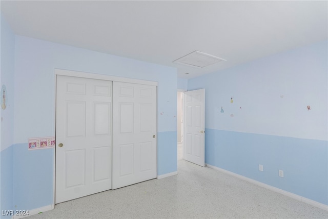 unfurnished bedroom featuring a closet