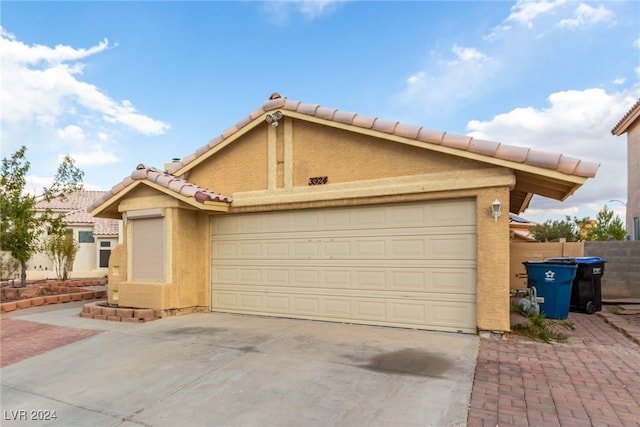 view of front of property with a garage