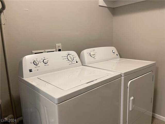 laundry area with washer and clothes dryer