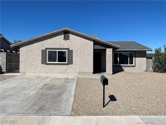 ranch-style house featuring a patio