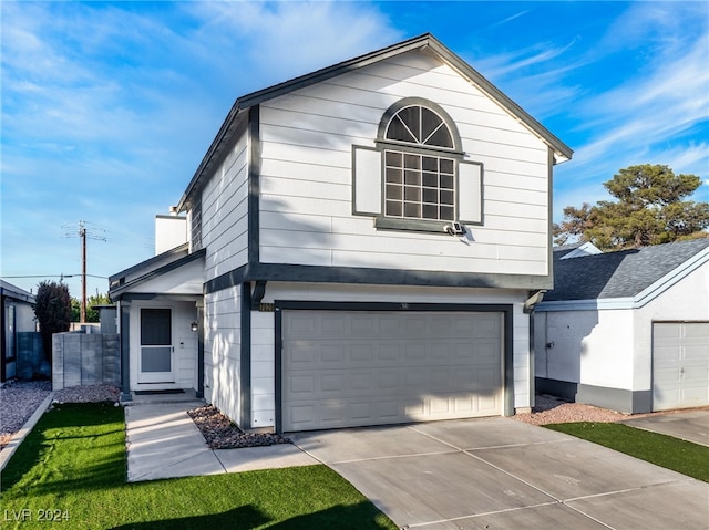 view of front of property with a garage