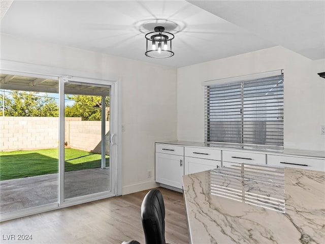 dining space featuring light hardwood / wood-style floors