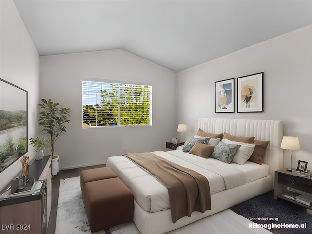 bedroom with carpet flooring and lofted ceiling