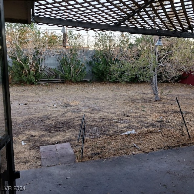 view of yard with a pergola