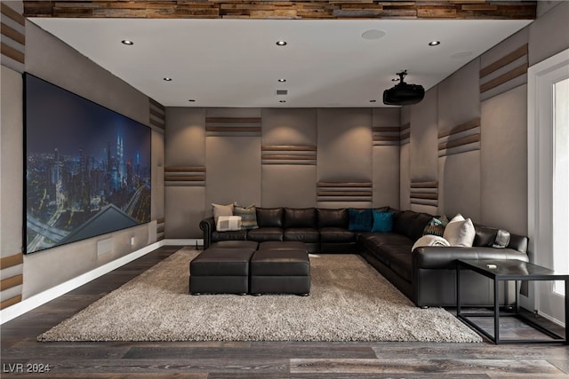 home theater featuring dark wood-type flooring