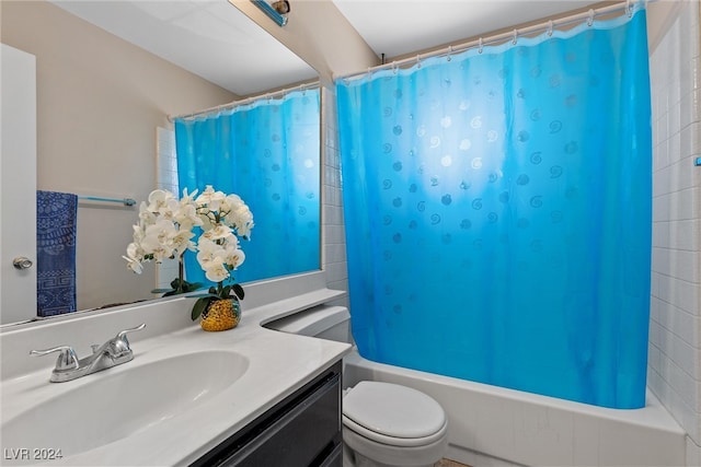 full bathroom with toilet, vanity, and shower / bathtub combination with curtain