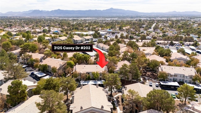 drone / aerial view featuring a mountain view