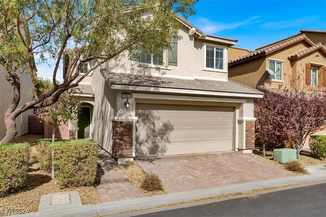 view of front of property featuring a garage