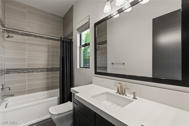 full bathroom featuring vanity, toilet, and shower / bathtub combination with curtain