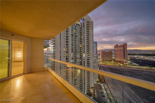 view of balcony at dusk