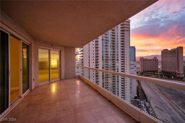 view of balcony at dusk