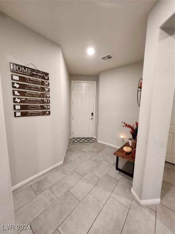 foyer with light tile patterned floors