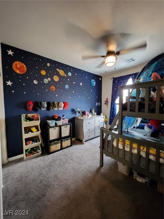 bedroom with ceiling fan and carpet floors