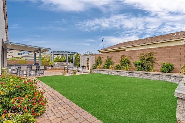 view of yard featuring a pergola, outdoor lounge area, and a patio