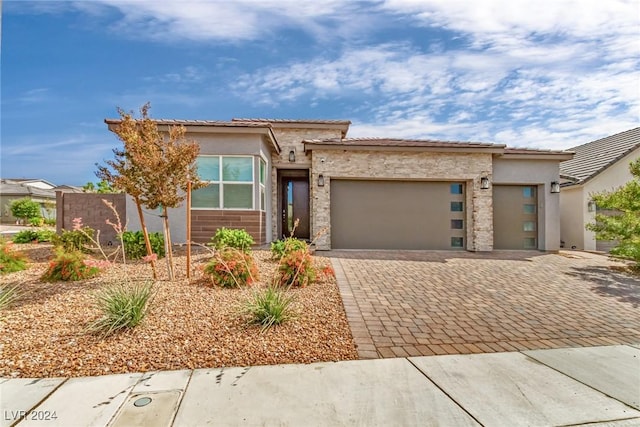 view of front of home with a garage