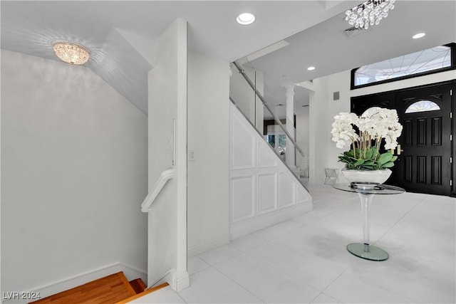 foyer with a notable chandelier