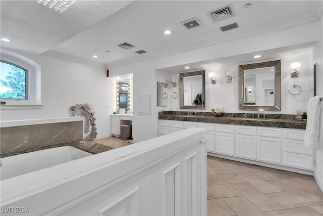 bathroom with tile patterned floors, vanity, and ornamental molding