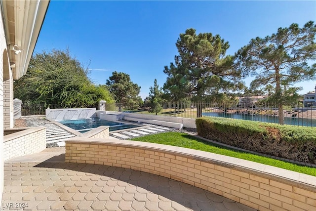 view of pool featuring a patio area