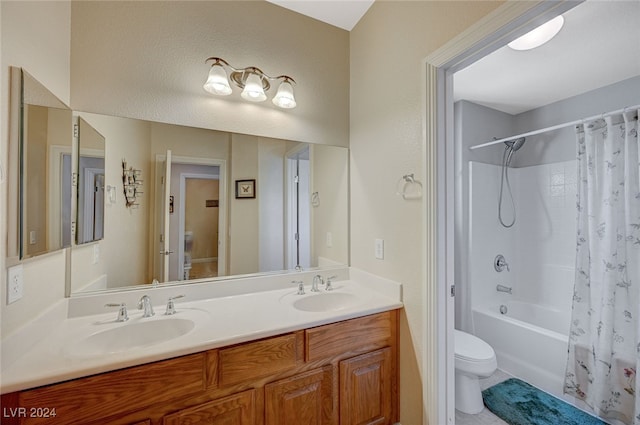 full bathroom featuring vanity, toilet, and shower / bath combination with curtain