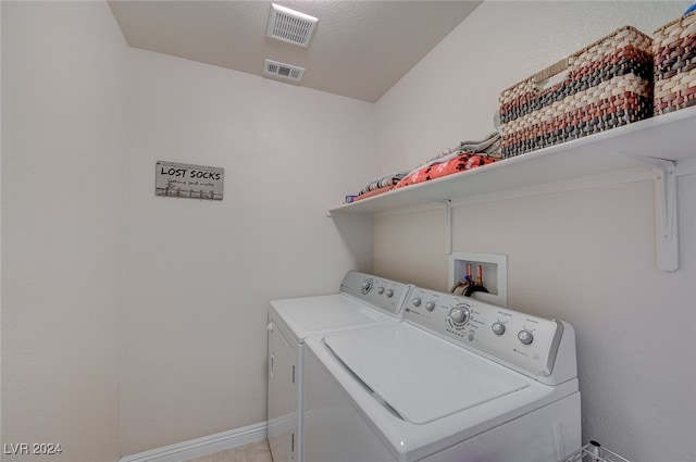 laundry area featuring washing machine and dryer