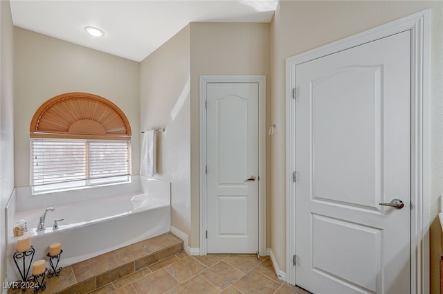 bathroom featuring a tub