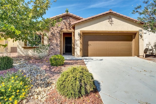 view of front of home with a garage