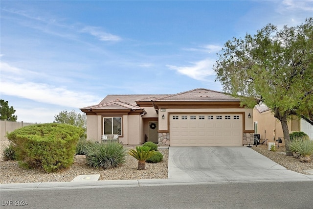 view of front of home with a garage