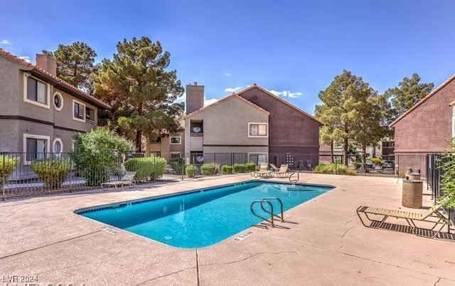 view of pool with a patio area