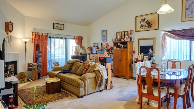 living room featuring lofted ceiling and light carpet