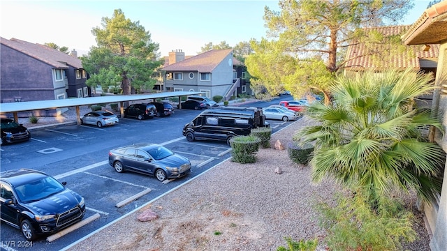 view of parking with a carport