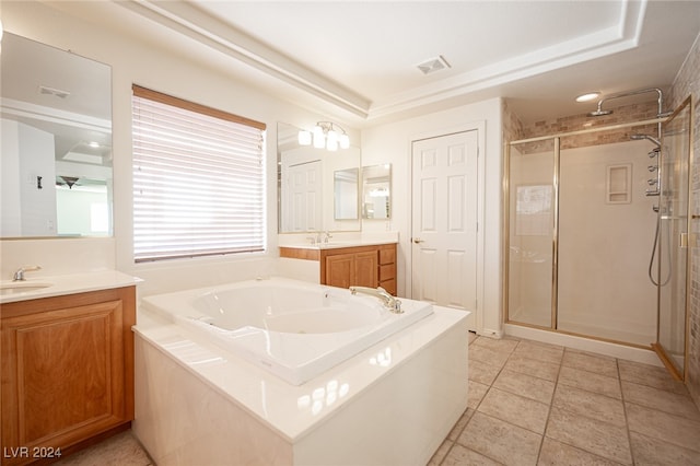 bathroom featuring separate shower and tub, tile patterned flooring, and vanity