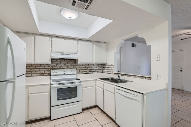 kitchen featuring ceiling fan, white cabinetry, light tile patterned flooring, sink, and white appliances