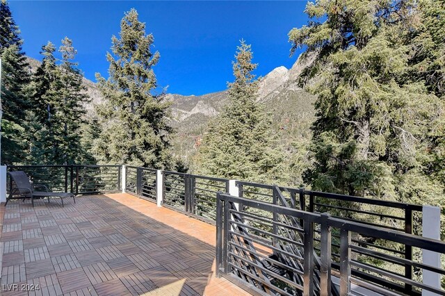 view of patio / terrace featuring a mountain view