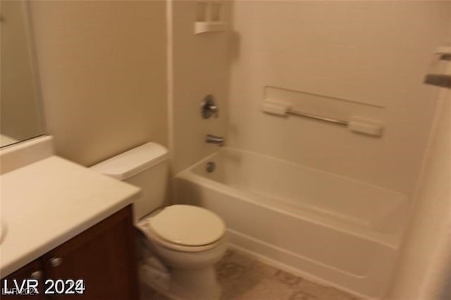 full bathroom with vanity, toilet, and washtub / shower combination