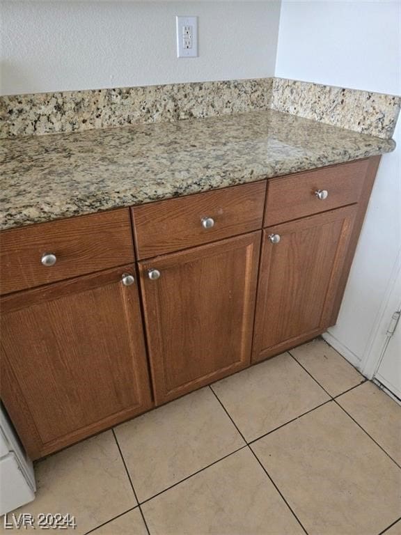 interior details with tile patterned flooring