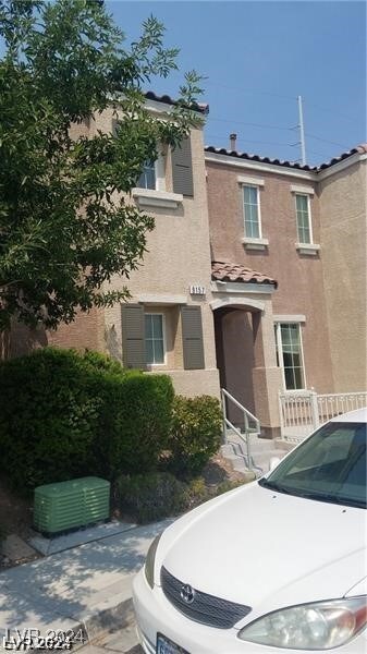 view of front facade with central AC unit