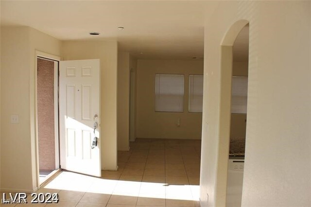 hallway with light tile patterned flooring