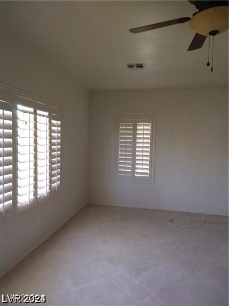 1652 Black Fox Canyon Rd, Henderson, NV 89052 - unfurnished room with ceiling fan and carpet floors