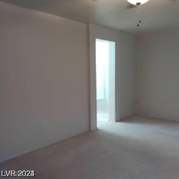 unfurnished room featuring ceiling fan