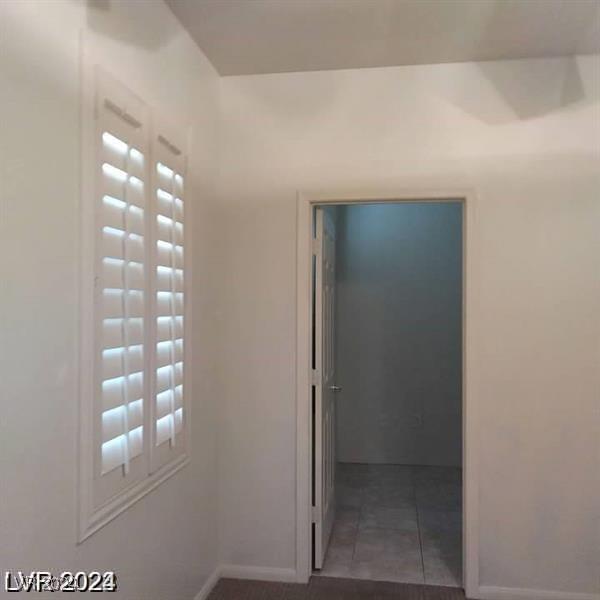 1652 Black Fox Canyon Rd, Henderson, NV 89052 - hallway with baseboards