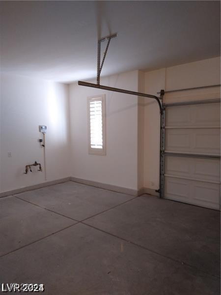 1652 Black Fox Canyon Rd, Henderson, NV 89052 - garage featuring baseboards